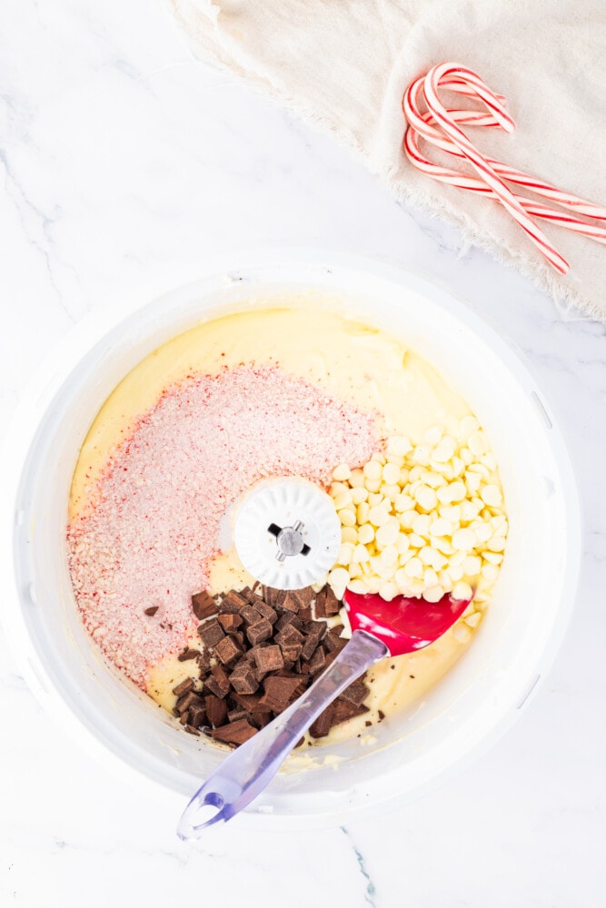 A bowl filled with candy canes and other ingredients.