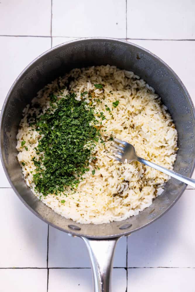 A frying pan filled with Chipotle Knockoff Cilantro Lime Rice.