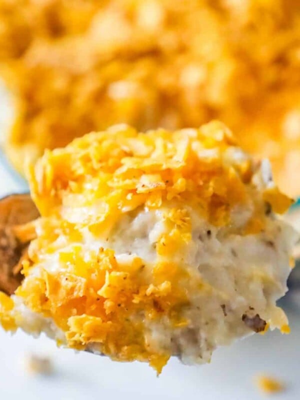 Cheesy Ranch Potato Casserole with a spoonful of mashed potatoes.