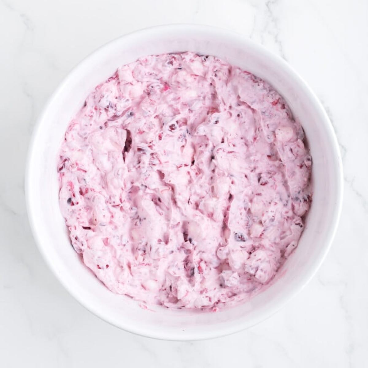 cranberry fluff mixed in a bowl