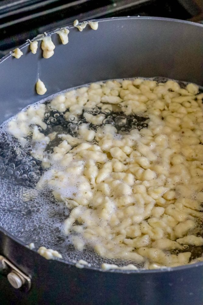 spaetzle boiling in a pot of water