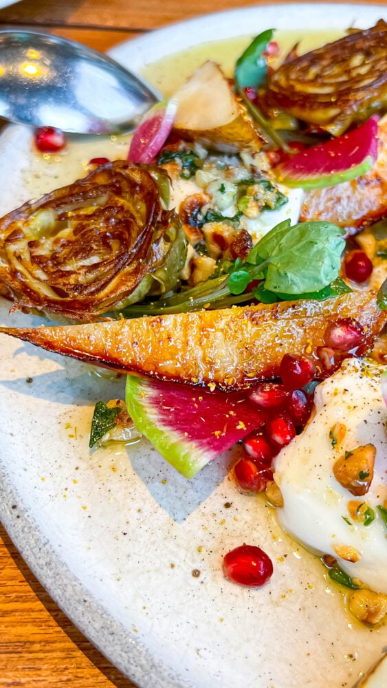 picture of burrata salad on a plate