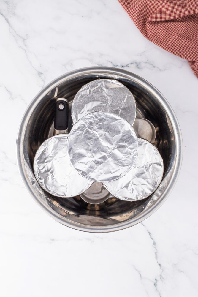 ramekins covered in foil in an instant pot
