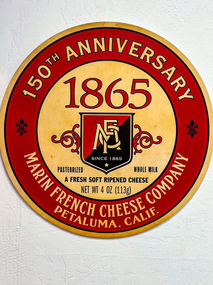 picture of old marin french cheese logo painted on wall 