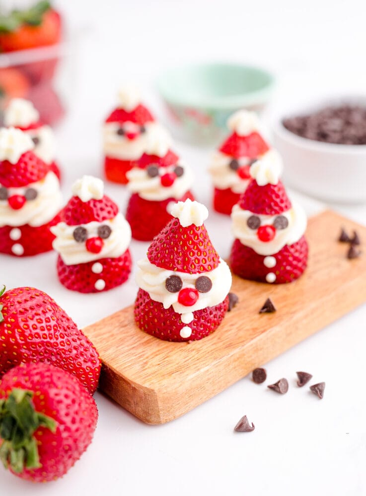 strawberry santas on a cutting board
