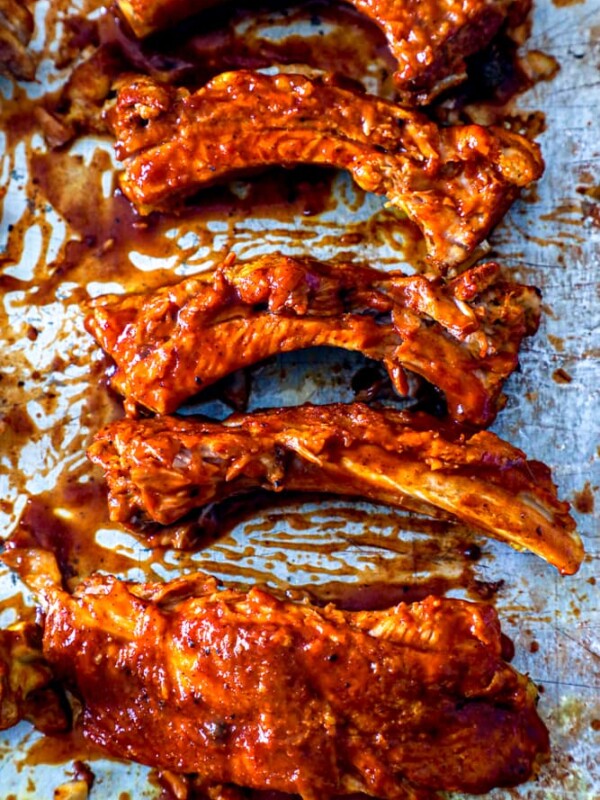 Bbq ribs on a baking sheet using the best instant pot keto ribs recipe.