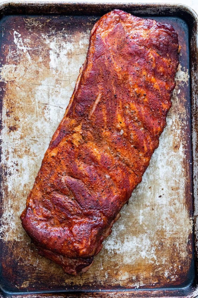 picture of smoked ribs on a baking sheet